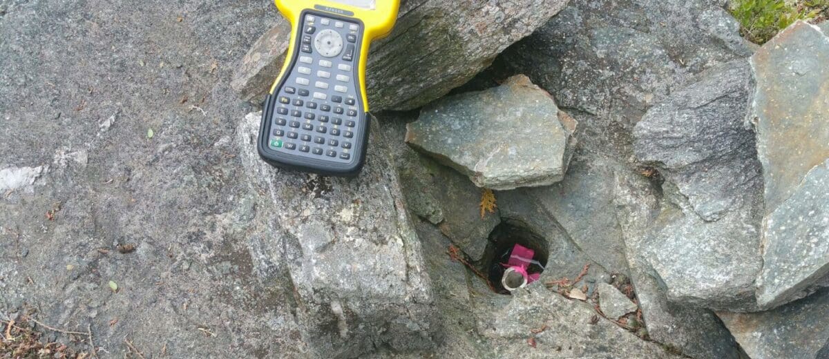 photo of pipe in rocks